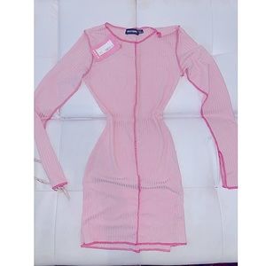 Tried on only. Never worn. With tags. Baby pink.